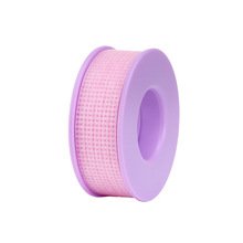 Breathable and gentle silicone gel tape with a cross-hatch pattern for easy tearing and separation.eyelash adhesive 