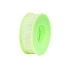 Breathable and gentle silicone gel tape with a cross-hatch pattern for easy tearing and separation.eyelash adhesive 